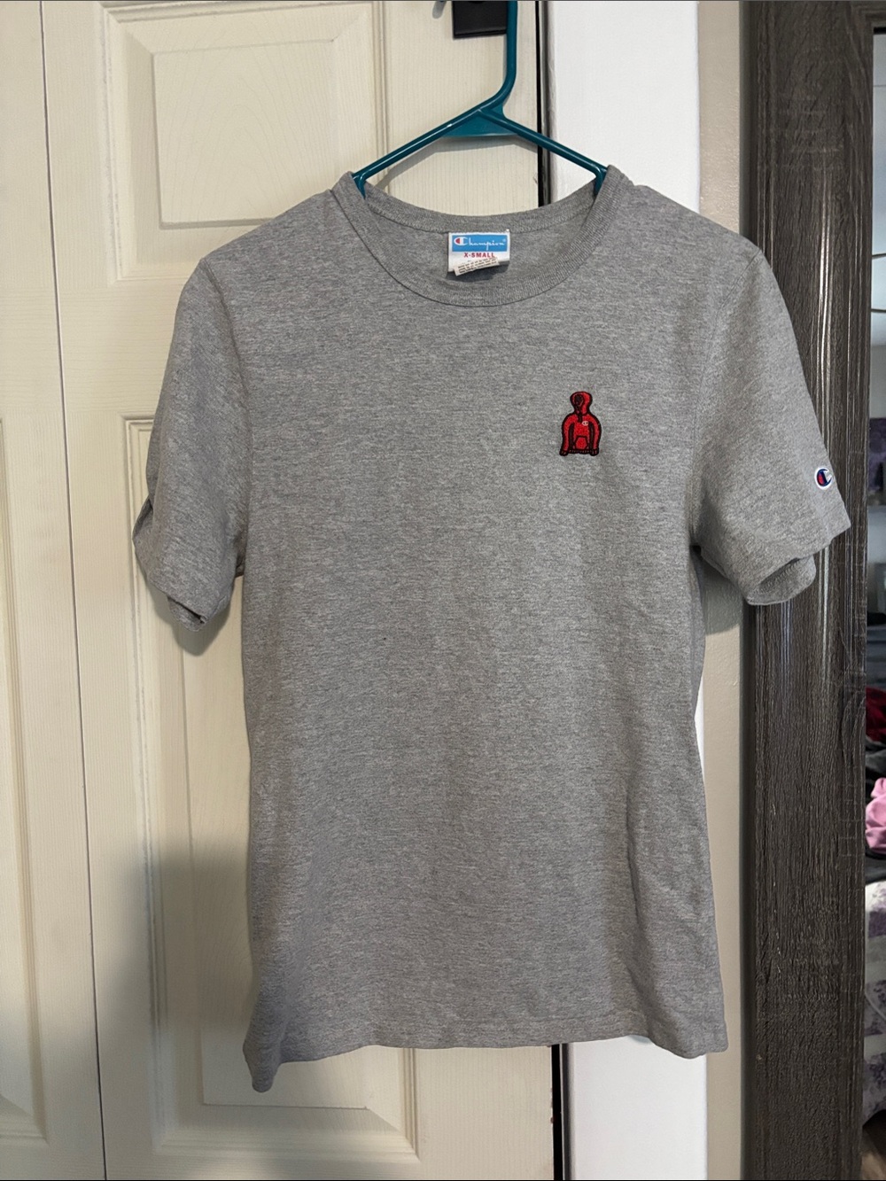 Champion Kids Gray Tee with Small Red Patch Logo